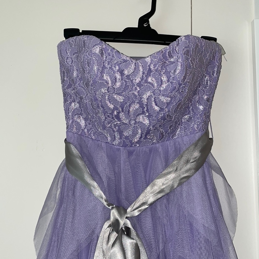 Dress from Macy’s. Light purple, similar to lavender. Size 1 in juniors.